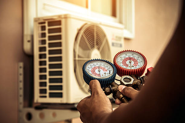 Professional Heat Pump Repair technician working in Verona, OH